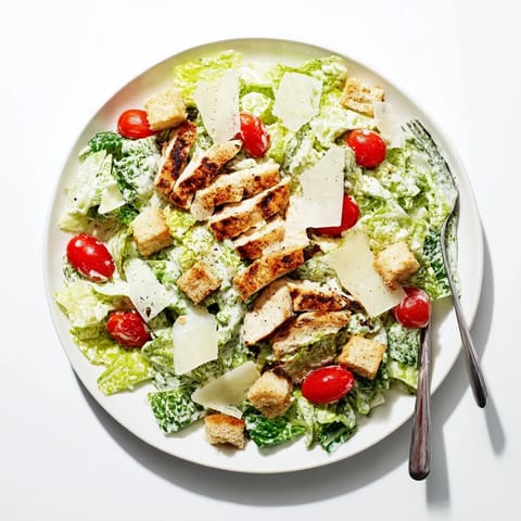 Homemade Yogurt Caesar Grilled Chicken Salad served fresh, featuring juicy chicken and tangy dressing for summer picnics.