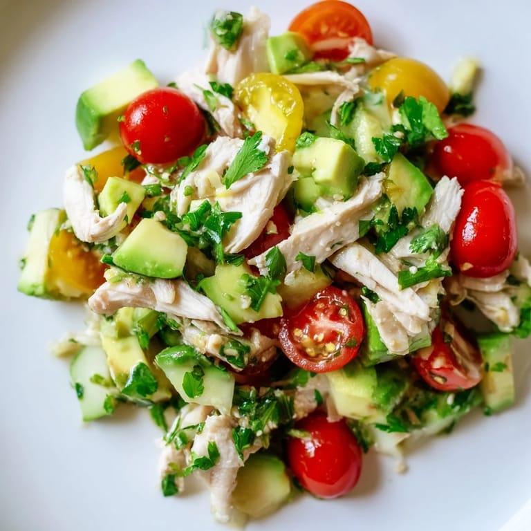 Freshly made Avocado Chicken Salad tossed with crisp cucumber, red onion, and a zesty lime-olive oil dressing.